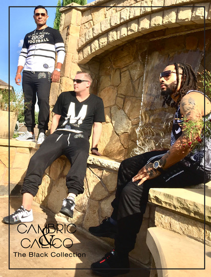 Models Relaxing by Water Fall in The Black Navy Button Joggers