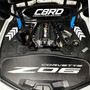 C8 Corvette Z06 engine bay with RaceLite Hatch Supports in anodized blue and C8RallyDriver display