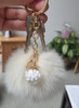 2.7" Faux Fur Pom Pom Keychain with Mini Capsule Charm .68 each