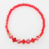 Faceted Bead Stretch Bracelet with Quatrefoil Charms .68 each