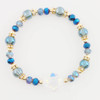 Beaded Stretch Bracelet with Iridescent Quatrefoil Charms .68 each