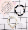 Pearl Bow Charm Stretch Bracelet .70 each