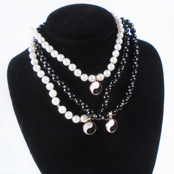White & Black Pearl Necklace w/ Ying Yang Pendant   .56 each 