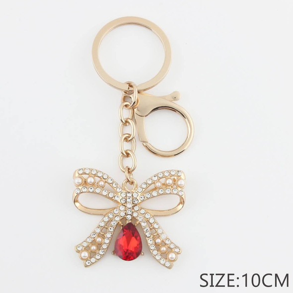 3.9" Crystal Bow Keychain with Pearl Accent .70 each