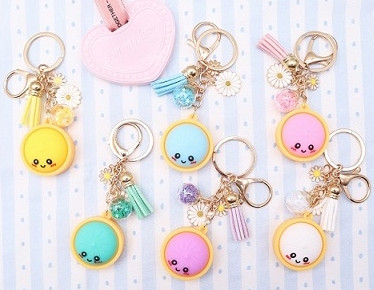 Dumpling Charm Keychain with Daisy, Tassel & Ball .75 each