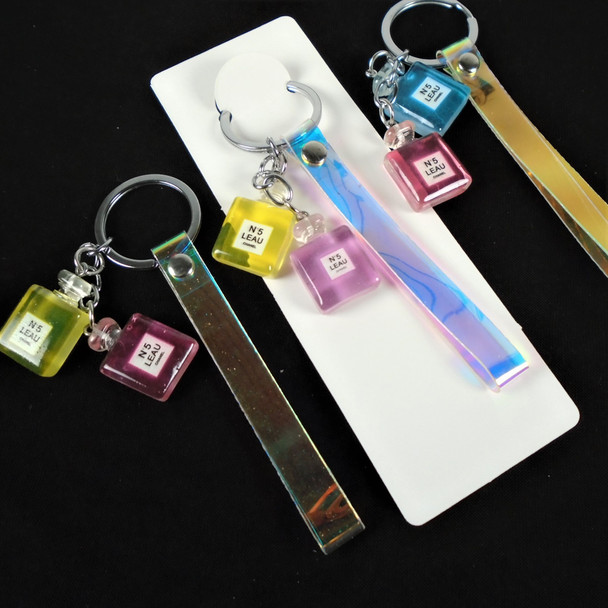 Shiney Strap Wrislet Keychains w/ Perfume Bottle Charms  .66 ea