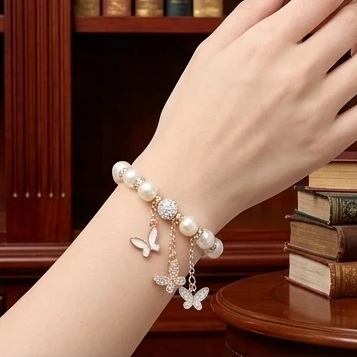 Pearl Butterfly Charm Bracelet .70 each