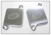 APE Air Injection Block Off Plates Suzuki Hayabusa (08-26), close-up shot of metallic air injection block off plates with APE logo for motorcycle exhaust system modification.