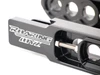 Roaring Toyz Bolt-On Swingarm Extensions Kawasaki ZX14R (06-25), close-up of the black metallic extension with white logo and bolt mechanism for motorcycle modification.