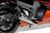 Brocks Performance Brocks Alien Head 2 Full Exhaust 14" Muffler Kawasaki ZX14R (12-26), close-up of the motorcycle's exhaust system and rear wheel showing the sleek, metallic muffler with black and silver finishes.