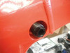 Ironless Innovations Aluminum Engine Mount Frame Inserts Suzuki Hayabusa (99-26), close-up of black engine mount insert installed on bright orange motorcycle frame.