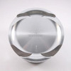 Wossner Piston Kit Kawasaki ZX10R (04-24), close-up of a metallic piston with engraved markings and curved surface for engine performance.