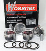 Wossner Piston Kit Kawasaki ZX12 (00-05), high performance pistons, piston rings, and wrist pins displayed in front of packaging.