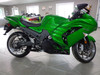 RCC Turbo Kit Stage 1 Kawasaki ZX14 (06-11), green Kawasaki Ninja motorcycle with aftermarket turbo kit installed, in a showroom setting. RCC Turbo Kit Stage 1 Kawasaki ZX14 (06-11), green Kawasaki Ninja motorcycle with aftermarket turbo kit installed, in a showroom setting.