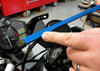 Motion Pro Clip On Handlebar Alignment Tool, close-up of the tool being used to align motorcycle handlebar.