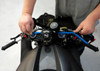 Motion Pro Clip On Handlebar Alignment Tool, a person using the tool to align motorcycle handlebars. Motion Pro Clip On Handlebar Alignment Tool, a person using the tool to align motorcycle handlebars.
