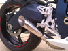 VooDoo Shorty Slip On Exhaust Suzuki GSXR1000 (12-16), motorcycle exhaust installed on a Suzuki GSXR1000 with a polished metal finish and black surrounding components.