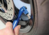 Motion Pro Professional Air Chuck Fill Tool, blue handheld air chuck used for inflating vehicle tires. Motion Pro Professional Air Chuck Fill Tool, blue handheld air chuck used for inflating vehicle tires.