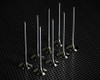 Vance & Hines Titanium Intake Valves Suzuki GSXR1000 (09-16), set of metallic intake valves arranged on a black textured surface.