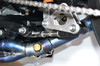 Brocks Performance Brocks Window Lowering Link Suzuki GSXR1000, close-up view of motorcycle part installed on a sportbike. Brocks Performance Brocks Window Lowering Link Suzuki GSXR1000, close-up view of motorcycle part installed on a sportbike.