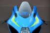 Brocks Performance Brocks Carbon Fiber Mirror Block Off Plates Suzuki GSXR1000 (17-27), installed on a blue motorcycle with a clear windshield and aerodynamic design.