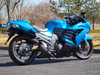 Brocks Performance Brocks Alien Head 2 Full Exhaust 14" Muffler Black Kawasaki ZX14R Motorcycle, blue sportbike with black exhaust system and aerodynamic fairings. Brocks Performance Brocks Alien Head 2 Full Exhaust 14" Muffler Black Kawasaki ZX14R Motorcycle, blue sportbike with black exhaust system and aerodynamic fairings.