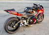 Brocks Performance Brocks Alien Head Full Exhaust 14" Muffler Suzuki GSXR1000 (07-08), motorcycle with custom exhaust system and racing decals.