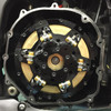 MTC Multistage Lock Up Gen II Clutch Kawasaki ZX14, close-up of the multi-stage clutch with black and gold components installed inside a motorcycle engine housing.
