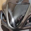 Montgomery Motorsports Carbon Fiber Headlight Insert Suzuki Hayabusa (08-20), close-up view of the carbon fiber headlight insert installed on a Suzuki Hayabusa motorcycle.