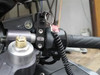 PMR Components PMR Easy Mount Stealth Tether Kill Switch w/Toggle, close-up view of the black kill switch with toggle and tether attachment mounted on a motorcycle handlebar.
