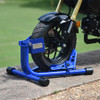 Baxley Scooter Chock, blue motorcycle wheel stabilizer for secure parking and transport.