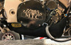 DME Taylor Lower Engine Restraint | Engine Diaper, black protective cover on motorcycle engine with MTC Engineering LLC logo and Taylor branding. DME Taylor Lower Engine Restraint | Engine Diaper, black protective cover on motorcycle engine with MTC Engineering LLC logo and Taylor branding.