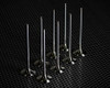 Vance & Hines Titanium Intake Valves Suzuki GSXR600 (08-26), set of high-performance titanium intake valves displayed on a black perforated surface.