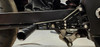 VooDoo Voodoo Rearsets, Grudge, Suzuki Hayabusa (99-25), motorcycle rearsets installed on a Suzuki Hayabusa motorcycle showing the footpeg and gear shifter linkage.