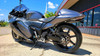 CeraCarbon Hybrid Rear Sprocket BST/Marvic/Coremoto 5 Bolt, 76mm OD, 100mm Bolt Circle, motorcycle part on black motorcycle in an outdoor setting.