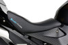 Brocks Performance Custom Corbin Seat BMW S1000RR (12-19) HP4 (12-15), close-up of black textured motorcycle seat with blue and white embroidery, mounted on black frame with detailed footrest area.