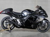M4 Performance Exhausts M4 Dual Black Retro-Drag Slip Ons Suzuki Hayabusa (08-20), motorcycle with sleek black aerodynamic design and upgraded performance exhaust system.