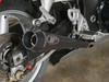 M4 Performance Exhausts M4 Dual Black Retro-Drag Slip Ons Suzuki Hayabusa (99-07), close-up of black motorcycle exhaust pipe with M4 logo, attached to a Suzuki Hayabusa motorcycle.