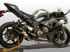 M4 Performance Exhausts M4 Tech1 Carbon Fiber Slip On Exhaust Kawasaki ZX-6R (09-25), side view of a black and silver sport motorcycle with a carbon fiber exhaust system installed.