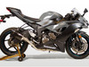 M4 Performance Exhausts M4 Tech1 Carbon Exhaust for Kawasaki ZX-6R (09-25), motorcycle side view showing sleek black and carbon fiber exhaust system installed on a sportbike.
