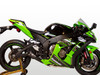 M4 Performance Exhausts M4 GP Black Exhaust Kawasaki ZX-10R (16-20) All Titanium, motorcycle with green and black body, racing design, side view showing exhaust system and front wheel.