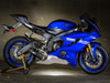 M4 Performance Exhausts M4 Carbon Fiber Full System Yamaha YZF-R6 (06-20), blue sport motorcycle with carbon fiber exhaust and full performance exhaust system.