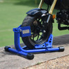 Baxley Small Bore Scooter Chock, blue motorcycle wheel stabilizer for secure parking of small bore scooters.