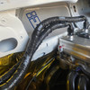 Product Design Engineering, Inc Fire Sleeve And Tape Kit, thermal protection and fire sleeve and tape kit for high-temperature applications installed in a vehicle engine compartment.