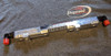 Dogwood Racing Fuel Rail Kawasaki ZX-14 (06-25), aluminum fuel injection rail with black and red fittings on a gray surface with Dogwood Race Engines sticker