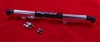 Dogwood Racing Fuel Rail Kawasaki ZX-14 (06-25), modern motorcycle fuel rail with mounting hardware on red background.