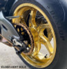 Coremoto Apex-6 Forged Aluminum Wheels Yamaha YZF-R6 (17-24), glossy light gold motorcycle wheel with a matching gold brake disc and tire.