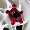 Coremoto Apex-6 Forged Aluminum Wheels Yamaha MT10/FZ10 (15-24), red anodized forged aluminum motorcycle wheel hub with black center cap.