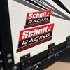 Schnitz Racing Motorcycle Performance Parts 5 inch Schnitz Racing Sticker, red, black, and white decal for motorcycle performance branding.