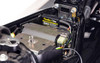 Healtech Thunderbox Power Distribution Module, close-up image showing the compact black module with yellow labeling installed inside a vehicle or machinery.